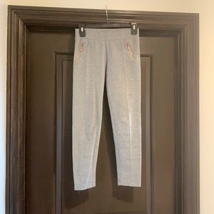 Grey Capri jogger w/ pleats and zippered pockets